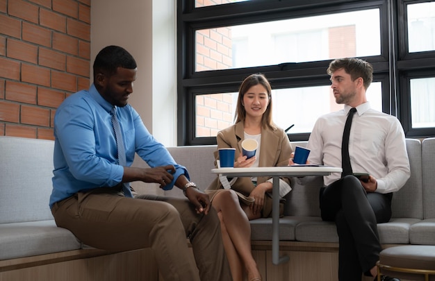 Businessman and businesswoman having a coffee break