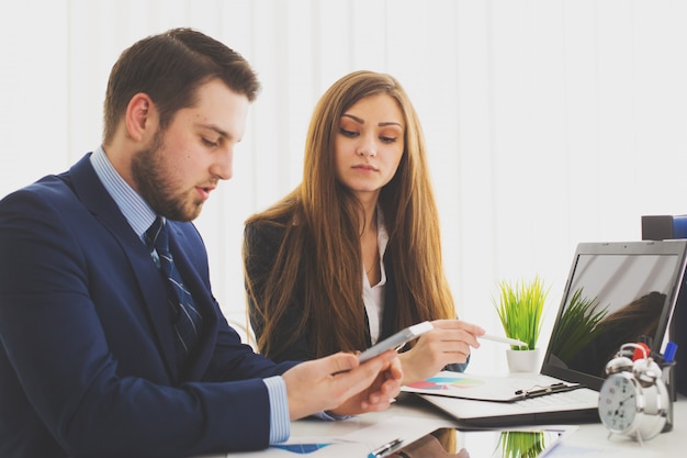 Businessman And Businesswoman Meeting In Modern Office