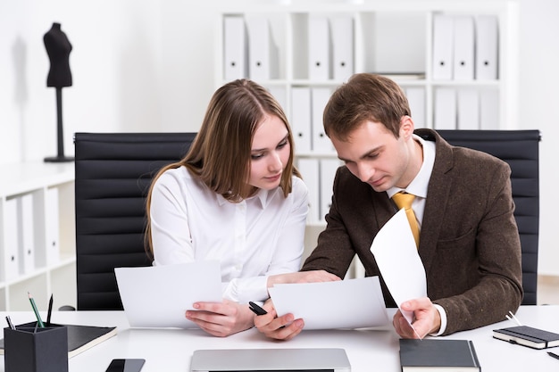 Businessman and businesswoman at work