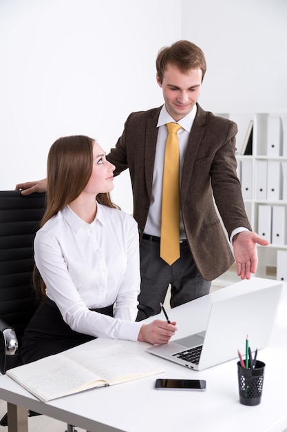 Businessman and businesswoman at work