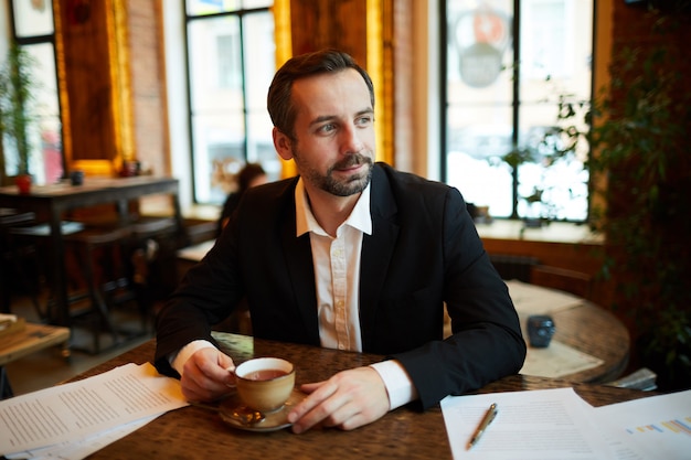 Businessman in Cafe