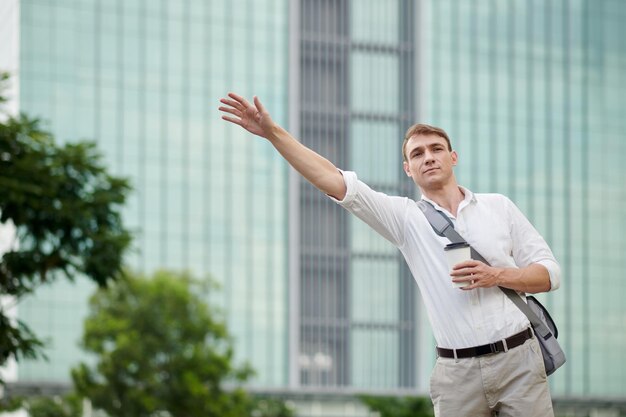 Businessman Catching Taxi