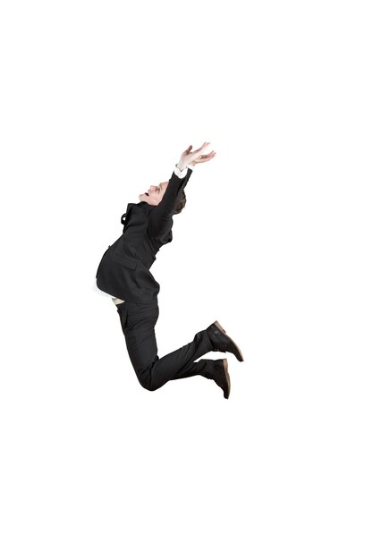 Businessman celebrating his success by jumping