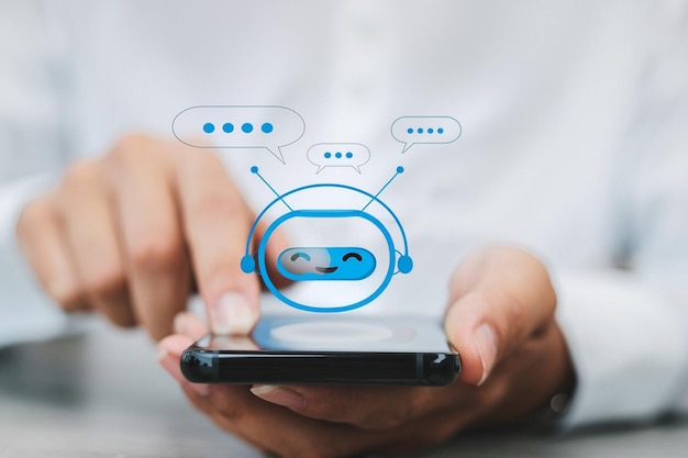 人工知能 (AI) を使ったビジネスマンがラップトップでチャットする