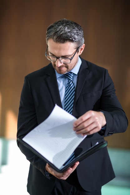 Businessman checking his document