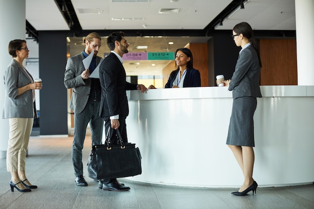 Businessman checking in to hotel