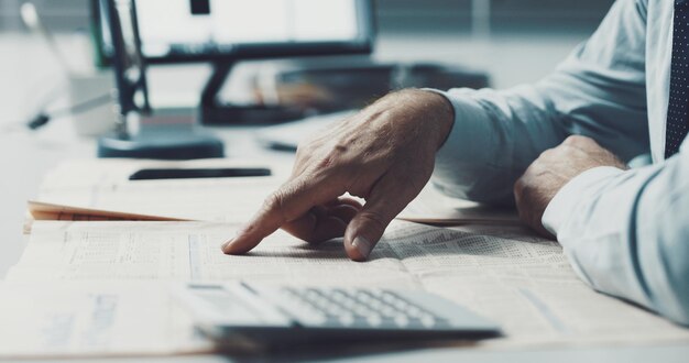 Businessman checking stock market news