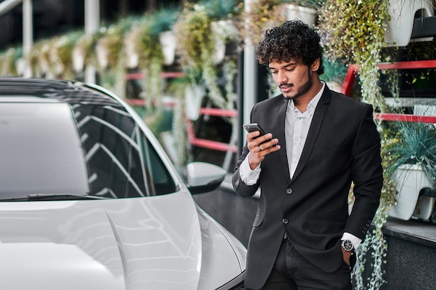 A businessman checks his email.