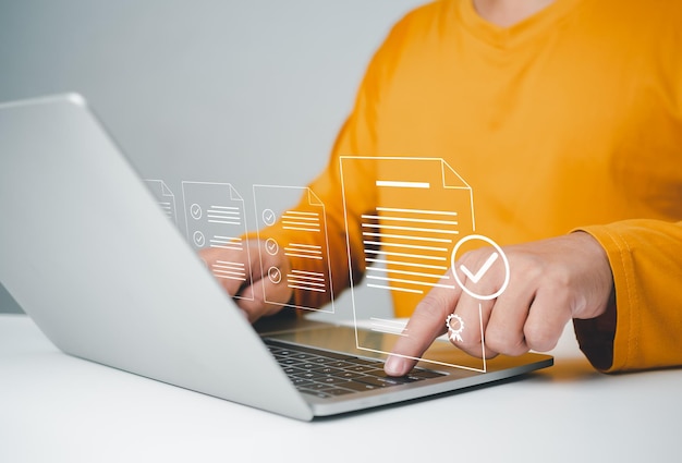businessman checks transaction documents or electronic contract documents prepare check and approve concept check electronic documents on digital documents and checklist approval