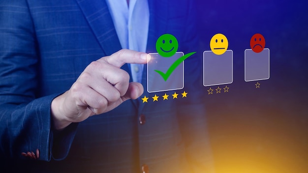 Businessman choosing happy smile face icon feedback rating and positive customer review experience satisfaction survey mental health assessment