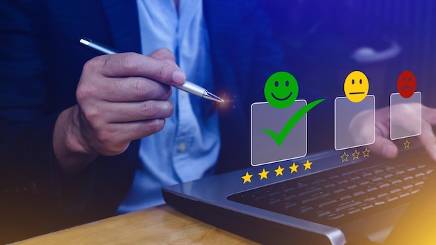 Businessman choosing happy smile face icon feedback rating and positive customer review experience satisfaction survey mental health assessment