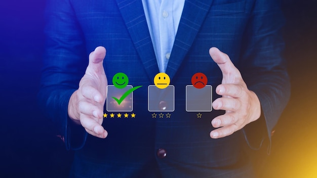 Businessman choosing happy smile face icon feedback rating and positive customer review experience satisfaction survey mental health assessment