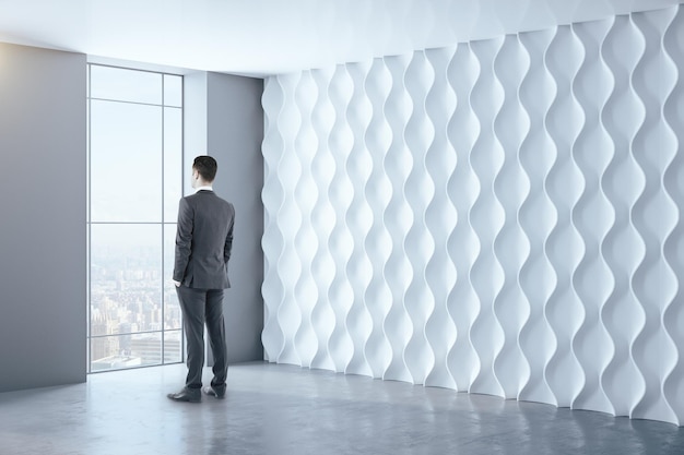 Businessman in clean interior