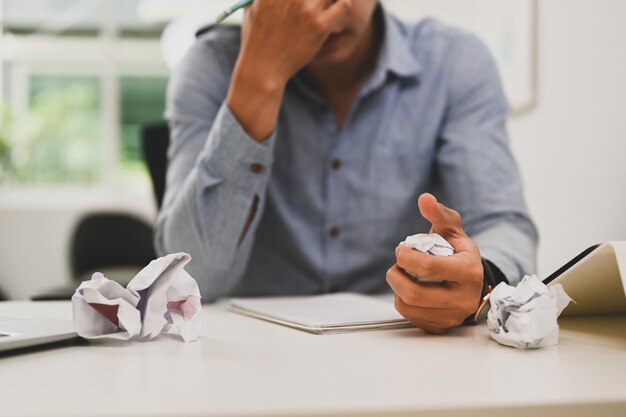 businessman crumpling paper and feeling was frustrated with working failed.