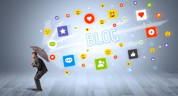businessman defending with umbrella from social media