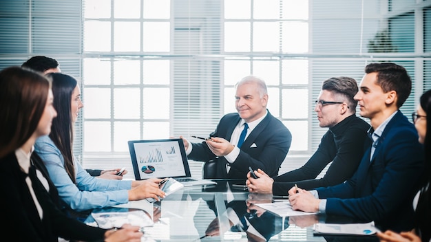 Businessman discussing financial data at a working meeting. the concept of teamwork