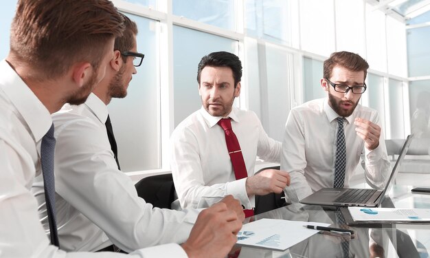 Businessman discussing new ideas with business team