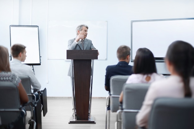 Businessman discussing with business team financial schedule