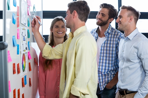 Businessman discussing with colleagues