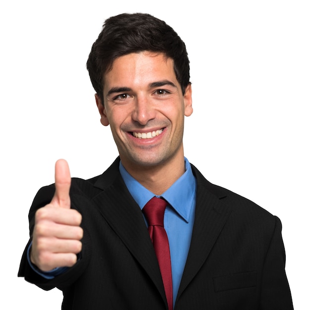 Businessman doing thumbs up sign