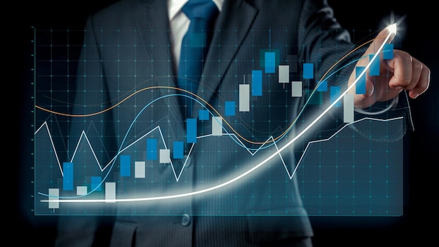 Businessman draw finance allusive graph chart showing business profit growth