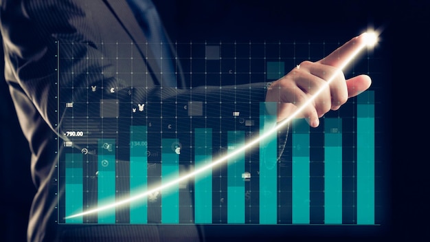 Businessman draw finance allusive graph chart showing business profit growth