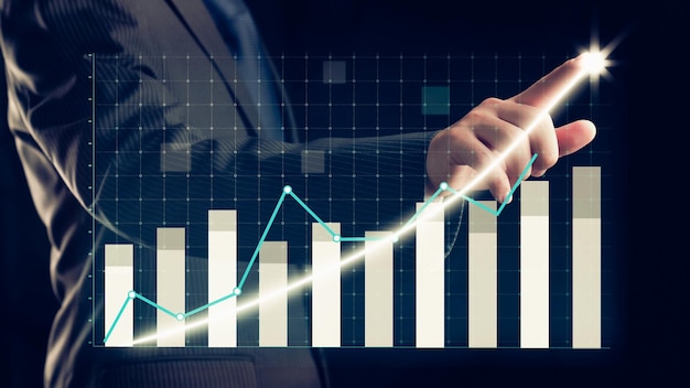 Businessman draw finance allusive graph chart showing business profit growth