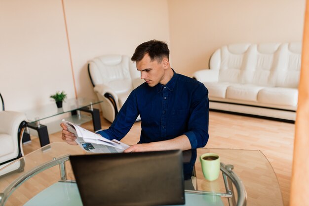 Businessman dressed in shirt having video call on computer in the home office, isolation