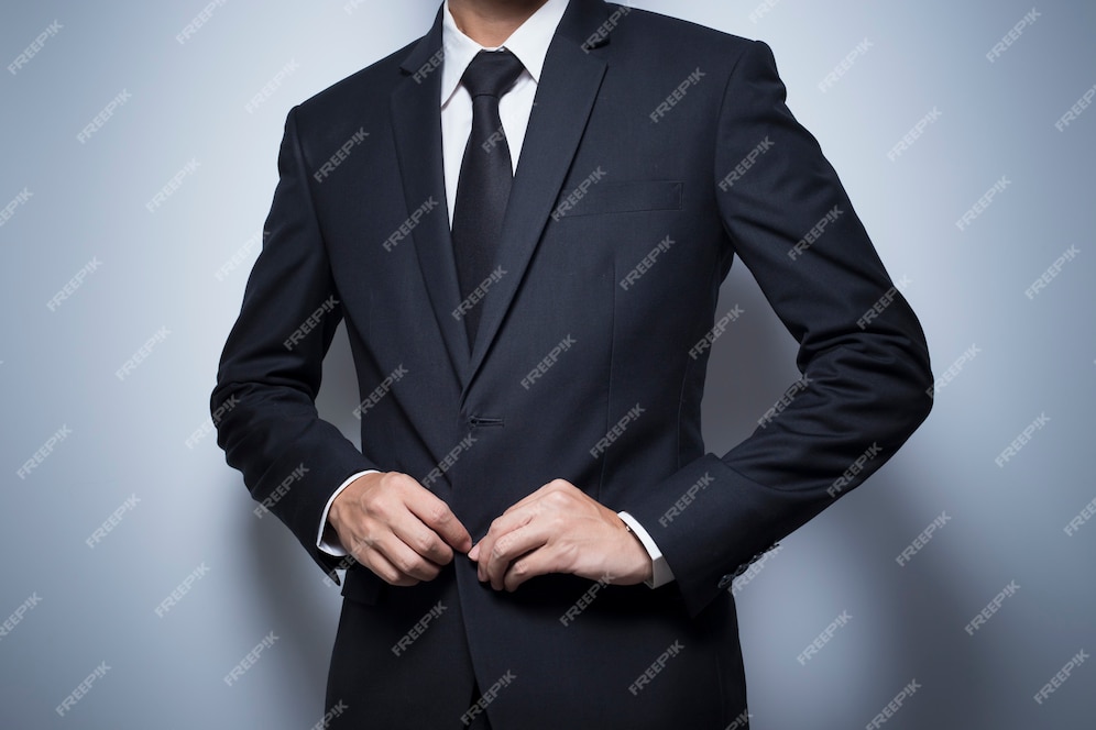 Premium Photo | Businessman Dressing Up a Black Suit