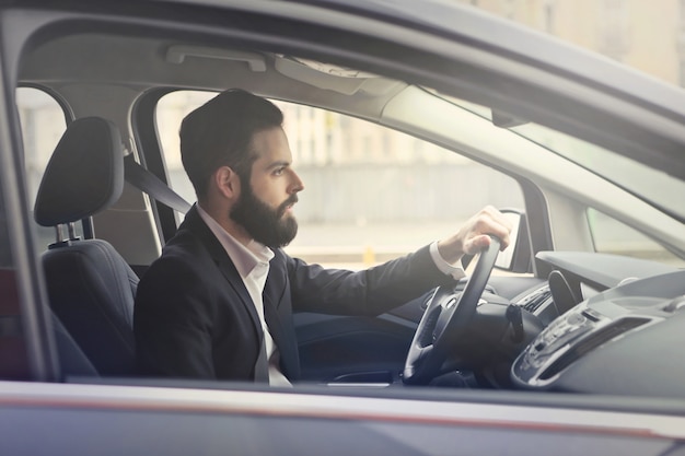 Businessman driving a car