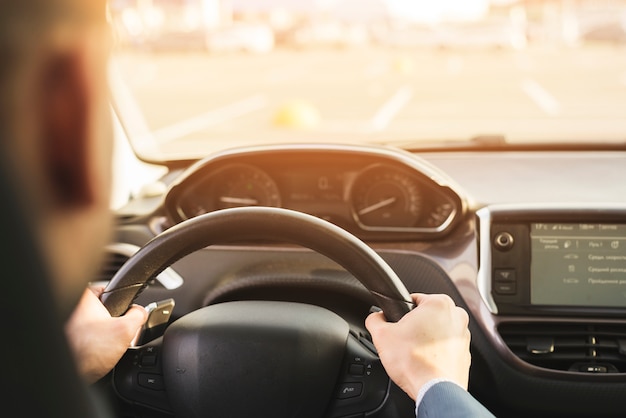 Businessman driving car