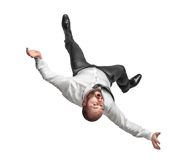 Businessman falling down isolated white background.