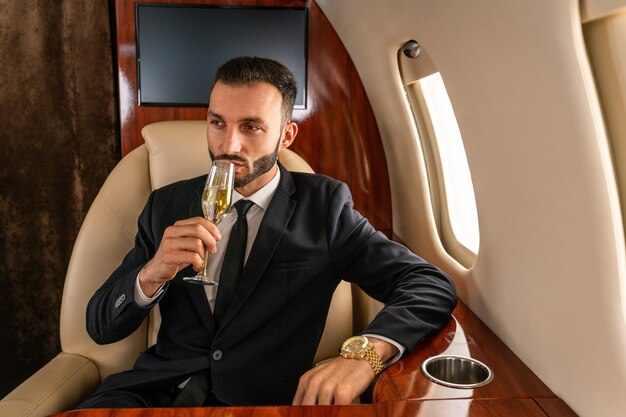 Businessman flying on private jet