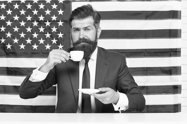 Businessman formal suit handsome man drinking coffee energy charge concept