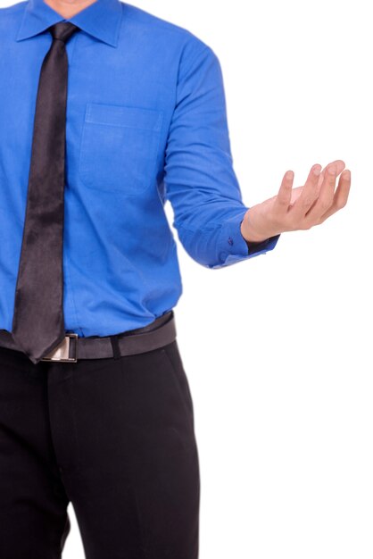 Businessman in formal wear standing with open palm for holding or showing something