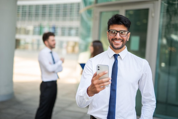 Businessman in front of a group of colleagues teamwork concept