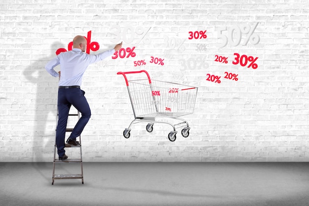 Businessman in front of a wall with a Red and white Trolley and sales discount - 3d render