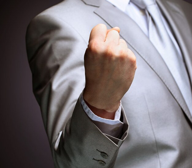 The businessman a gesture a finger