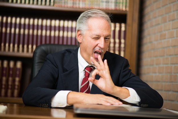 Businessman giving ok sign