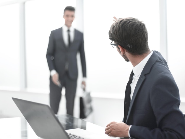 Businessman greet their colleague