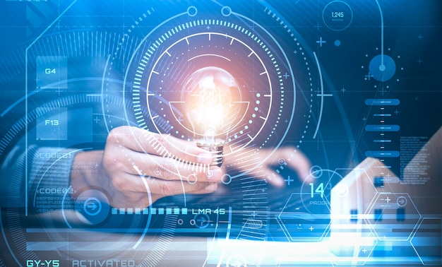 businessman hand holding light bulb with technology network connection line on planning strategy analysis solution and development concept creative new idea and innovation with brain and light bulbs