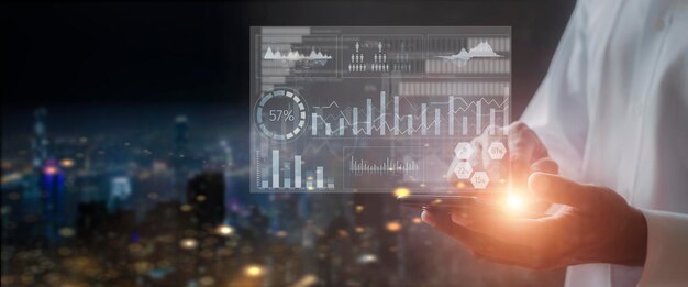 Businessman hand holds mobilephone with simulation statistics sc