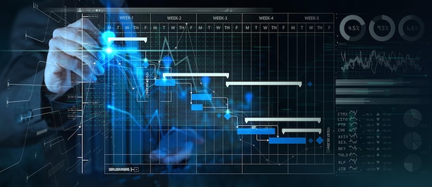 Businessman hand Project manager working and update tasks with milestones progress planning