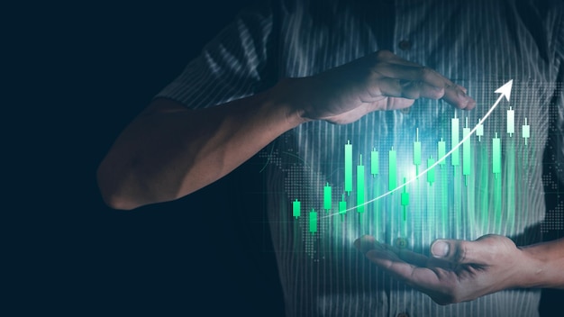 Businessman hand show Stock chart showing rising stock sign with graph indicator Interest rate financial and mortgage rates concept