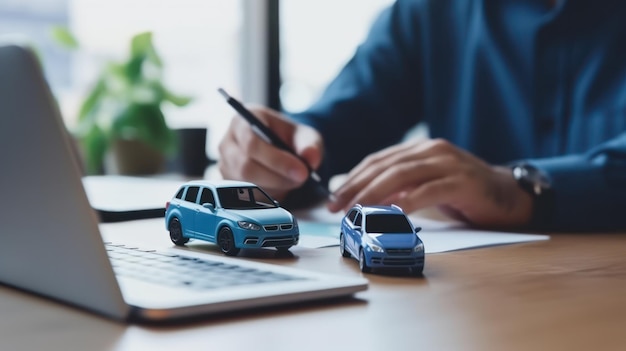 Businessman hand signing document with small car model on table buying car concept