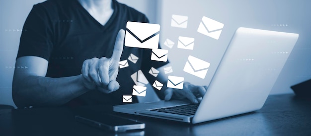 Businessman hand touch communication icons letter icon email icons and newsletter email and protect your personal information or spam mail Customer service call center contact