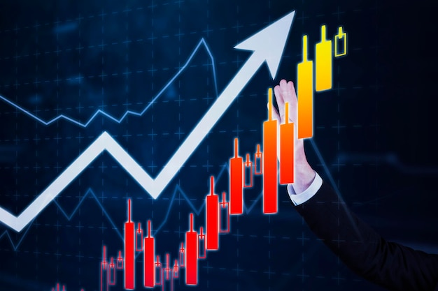 Businessman hand touching growth candlestick chart