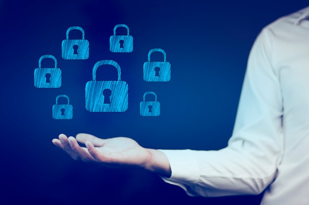 businessman hand with many lock icons