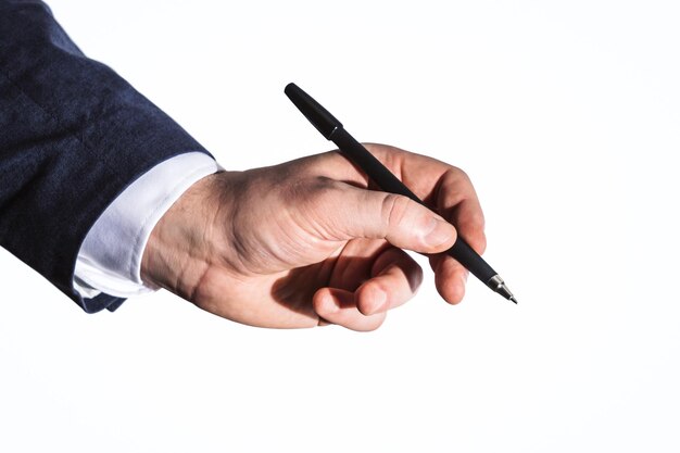 Фото Бизнесмен рука с ручкой, изолированные на белом фоне концепция бизнеса и образования закрыть