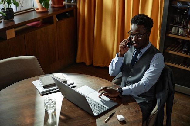 Businessman having conversation on mobile phone